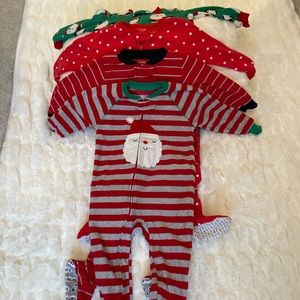 Carters unisex Christmas fleece footie pajamas. 18 months. Barely worn. 4 pieces